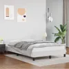 A white bed frame with a gray blanket is shown in a bedroom setting. Anteprima dell’immagine prodotto
