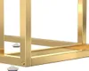 A close-up view of the gold-colored metal frame of a table, showing its legs and feet. Podgląd zdjęcia produktu