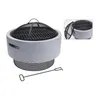 A round, light gray fire pit with a black grill and a black poker. Anteprima dell’immagine prodotto