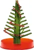 A small, green, artificial Christmas tree decorated with red beads, standing in a red base. Produktbild-Vorschau