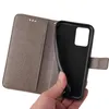 A hand holding a gray flip phone case open to reveal the inside. Produktbild-Vorschau