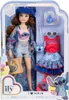 A doll in its packaging, with accessories. Voir les images du produit