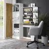 A home office setup with a desk, chair, and shelving unit. Anteprima dell’immagine prodotto