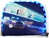 A close-up of a zippered pouch with a digital graphic of police cars and city buildings, illuminated by blue LED lights around the edge. Produktbild-Vorschau