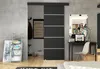 A modern bedroom with a sliding door, desk, and artwork. Náhľad obrázku produktu
