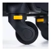 Close-up of a black suitcase wheel with a yellow accent. Produktbild-Vorschau