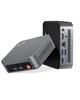 Two mini-PCs are shown against a white background. One is angled towards the viewer, showing its front and side. The other is upright, showing its back and side with ports. Produktbild-Vorschau