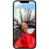 A person's face and hair are visible on a smartphone screen, with a blue sky and clouds in the background. Produktbild-Vorschau