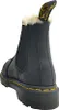 A rear view of a black Dr. Martens Chelsea boot with a yellow pull tab and faux fur lining. Produktbild-Vorschau