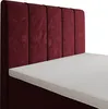 Close-up view of a bed's headboard and mattress. Produktbild-Vorschau