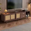 A living room scene featuring a TV stand with a television mounted above it. Produktbild-Vorschau