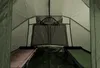 Interior view of a tent with two cots. Voir les images du produit