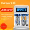 A white battery charger with four AA batteries inserted, displayed against an orange and white background with marketing text. Podgląd zdjęcia produktu