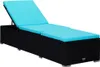 A black rattan sun lounger with a blue cushion, shown from a side-diagonal angle against a white background. Náhľad obrázku produktu