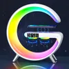 A futuristic lamp with a rainbow light, a digital clock, and a phone charging wirelessly. Produktbild-Vorschau