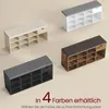 Four different colored shoe benches are displayed on a light beige background, showcasing various color options. Produktbild-Vorschau