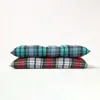 Two plaid cushions are stacked on top of each other against a white background. Náhled obrázku produktu