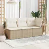 An outdoor patio setting with a beige rattan sofa and cream cushions. Náhľad obrázku produktu