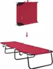 A folded and unfolded red camping cot shown against a white background. Produktbild-Vorschau