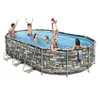 People are enjoying themselves in an oval-shaped above-ground swimming pool. Náhled obrázku produktu
