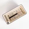 A top-down view of a self-watering planter box with a thermometer inside. Náhled obrázku produktu