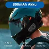 A person wearing a motorcycle helmet with a communication device attached. Anteprima dell’immagine prodotto