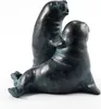 A sculpture of two seals on a white background. Produktbild-Vorschau
