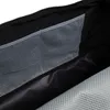 Close-up view of the interior of a black bag, showing a mesh pocket. Produktbild-Vorschau