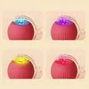 A collage of four images showing a red interactive ball toy with different colored lights. Náhled obrázku produktu