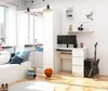 A modern white desk with a computer, guitar, and other accessories in a room. Voir les images du produit