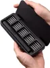 Hands holding an open black case containing a black electric screwdriver and multiple bits. Náhled obrázku produktu