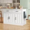 A white kitchen island with drawers and doors, a coffee maker, pancakes, and bags of coffee on top, with a light green refrigerator in the background. Náhled obrázku produktu