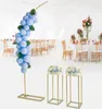 A wedding or event setup with balloon decorations and floral arrangements on pedestals. Náhled obrázku produktu