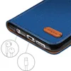 Close-up of a blue flip case for a smartphone, showing the interior and ports. Produktbild-Vorschau