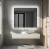 A modern bathroom with a large illuminated mirror above a vanity and sink. Produktbild-Vorschau