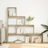 A bookshelf unit with various decorative items and books. Produktbild-Vorschau