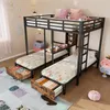 A bedroom scene with a black metal bunk bed with two lower beds and one upper bed, featuring built-in storage drawers and a desk area. The beds are made with patterned bedding and pillows. The room is decorated with colorful banners and a rug with cactus p Anteprima dell’immagine prodotto