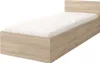A single bed with a white mattress and a wooden frame, shown against a white background. Produktbild-Vorschau