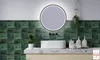 A modern bathroom vanity with a sink, mirror, and tiled backsplash. Produktbild-Vorschau