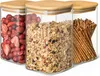 Three glass storage containers with bamboo lids, filled with different food items. Produktbild-Vorschau