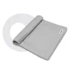 A rolled-up grey swaddle blanket is shown on a white and light gray background. Náhľad obrázku produktu