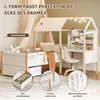 A child's bed with an integrated desk and bookshelf, set up in a room. Produktbild-Vorschau