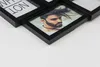 A close-up shot of a black collage photo frame with a picture of a man inside. Produktbild-Vorschau