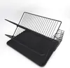 A black dish drying rack with a tray and cutlery holder, shown against a white background. Náhled obrázku produktu