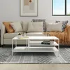A modern living room scene with a couch, coffee table, and rug. Voir les images du produit