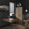 A modern office setting with a desk, chair, cabinet, and artwork. Produktbild-Vorschau