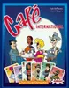 The image shows the box art for the card game Cafe International, featuring cartoon characters sitting at a cafe table and several game cards displayed in the foreground. Produktbild-Vorschau