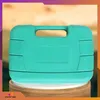 A teal tool case is displayed on a wooden stand against a blurred background with purple and orange gradient borders. Produktbild-Vorschau