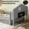 A grey children's bed with a house-shaped headboard featuring a chalkboard. Náhled obrázku produktu