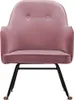 A pink velvet rocking chair with black metal legs against a white background.